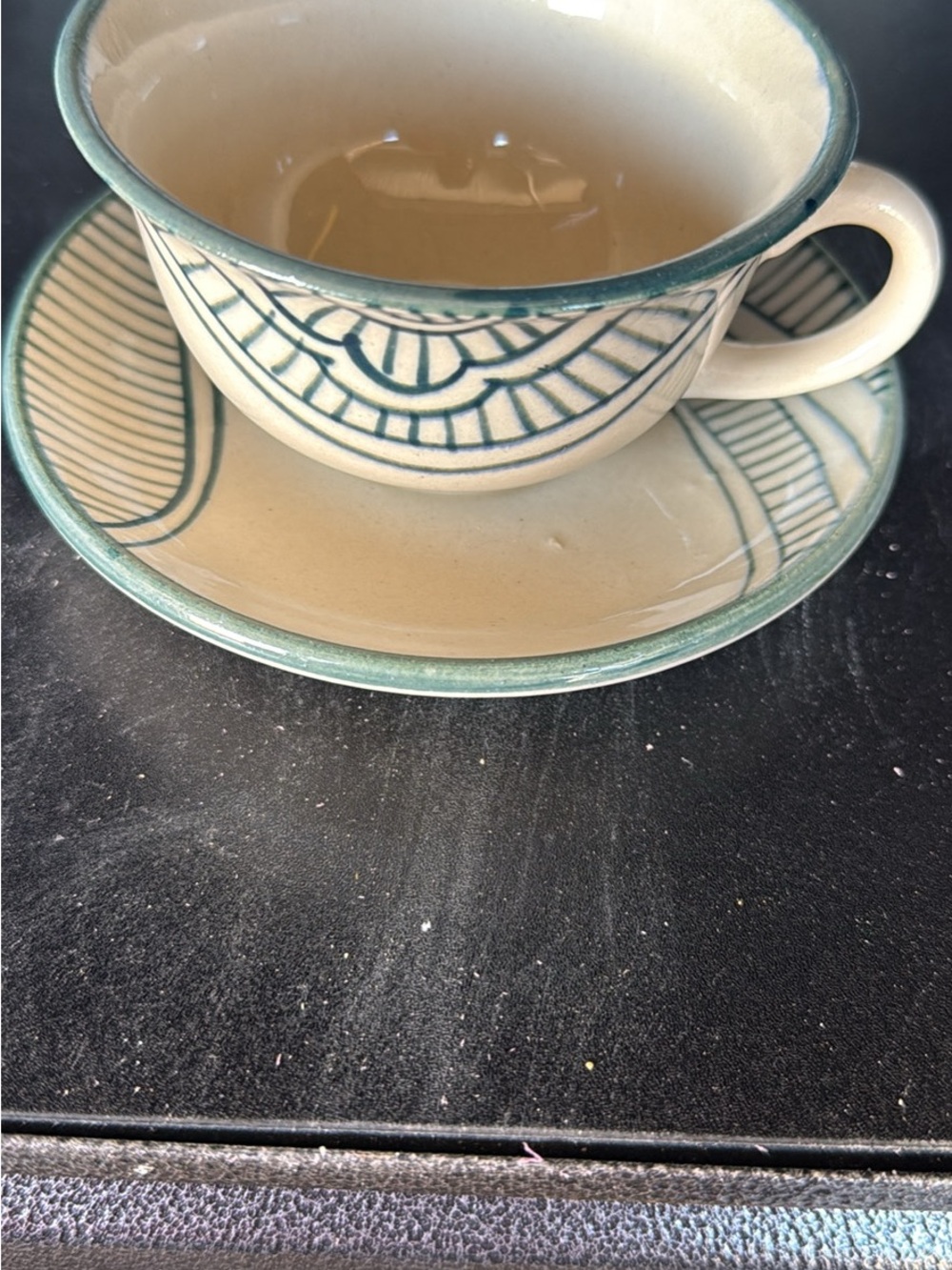 Ceramic Teacup and Saucer Set in Cream with Green Trim